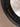 Close-up of black leather sweatband with KhaanQuest gold text — mark of fine craftsmanship.
